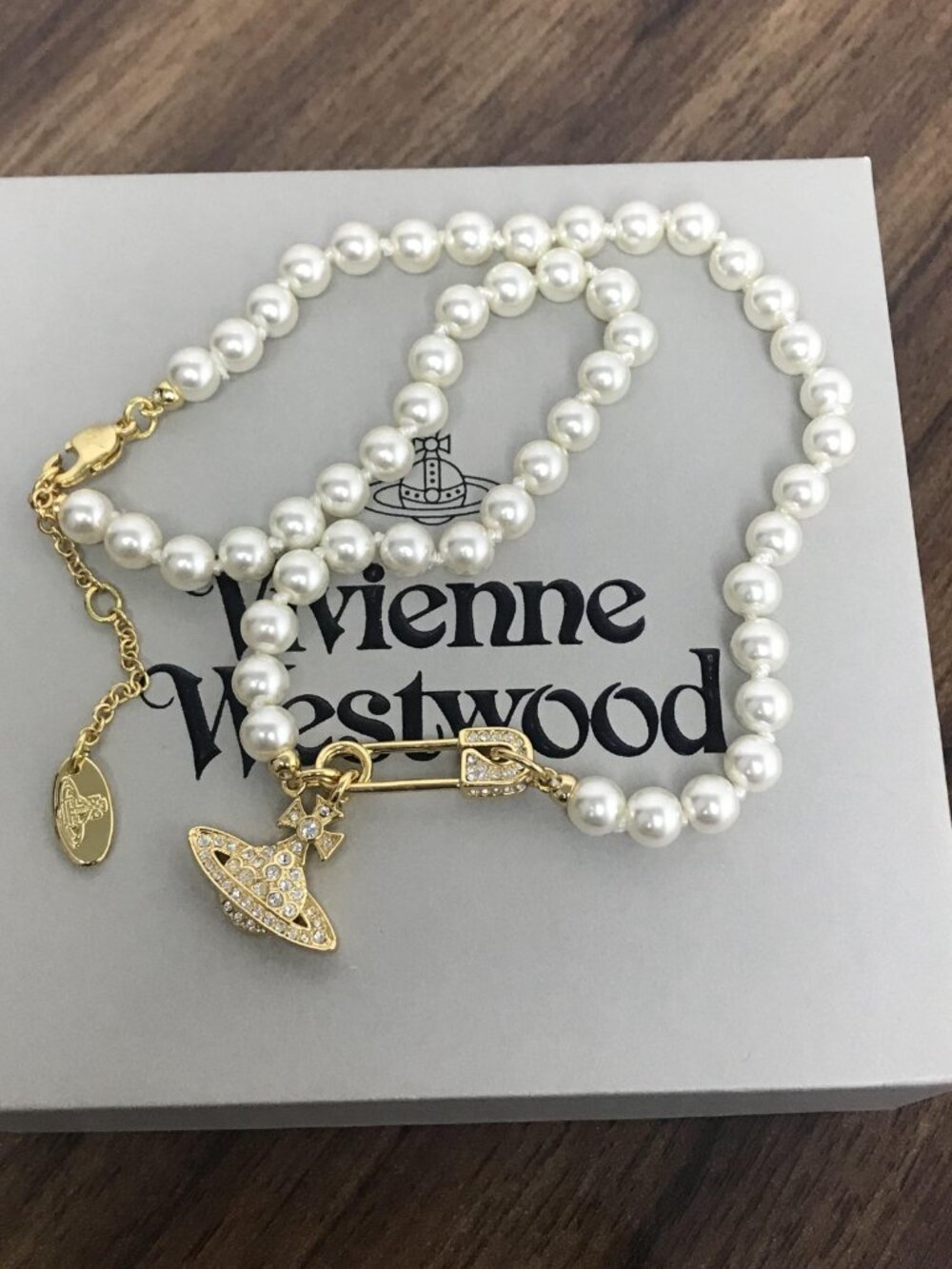Vivienne Westwood Pearl Necklace with Gold Orb Charm